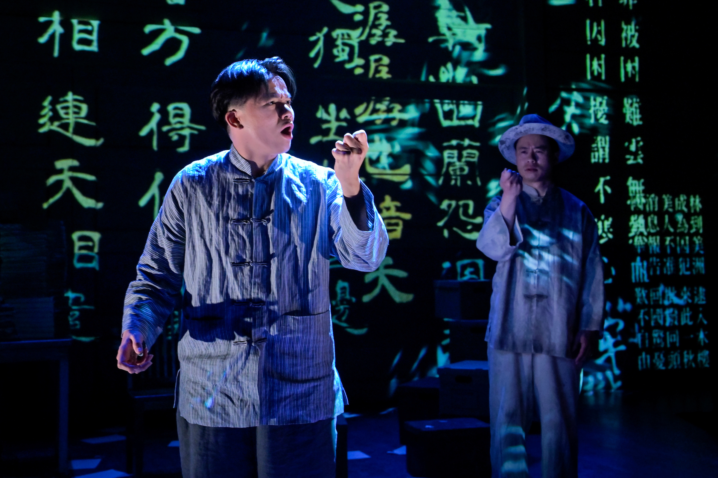 15 Tommy Bo (Moon Gyet) and Whit K. Lee (Yip/One) in Lloyd Suh's The Far Country. (Photo by Kevin Berne/Berkeley Rep)
