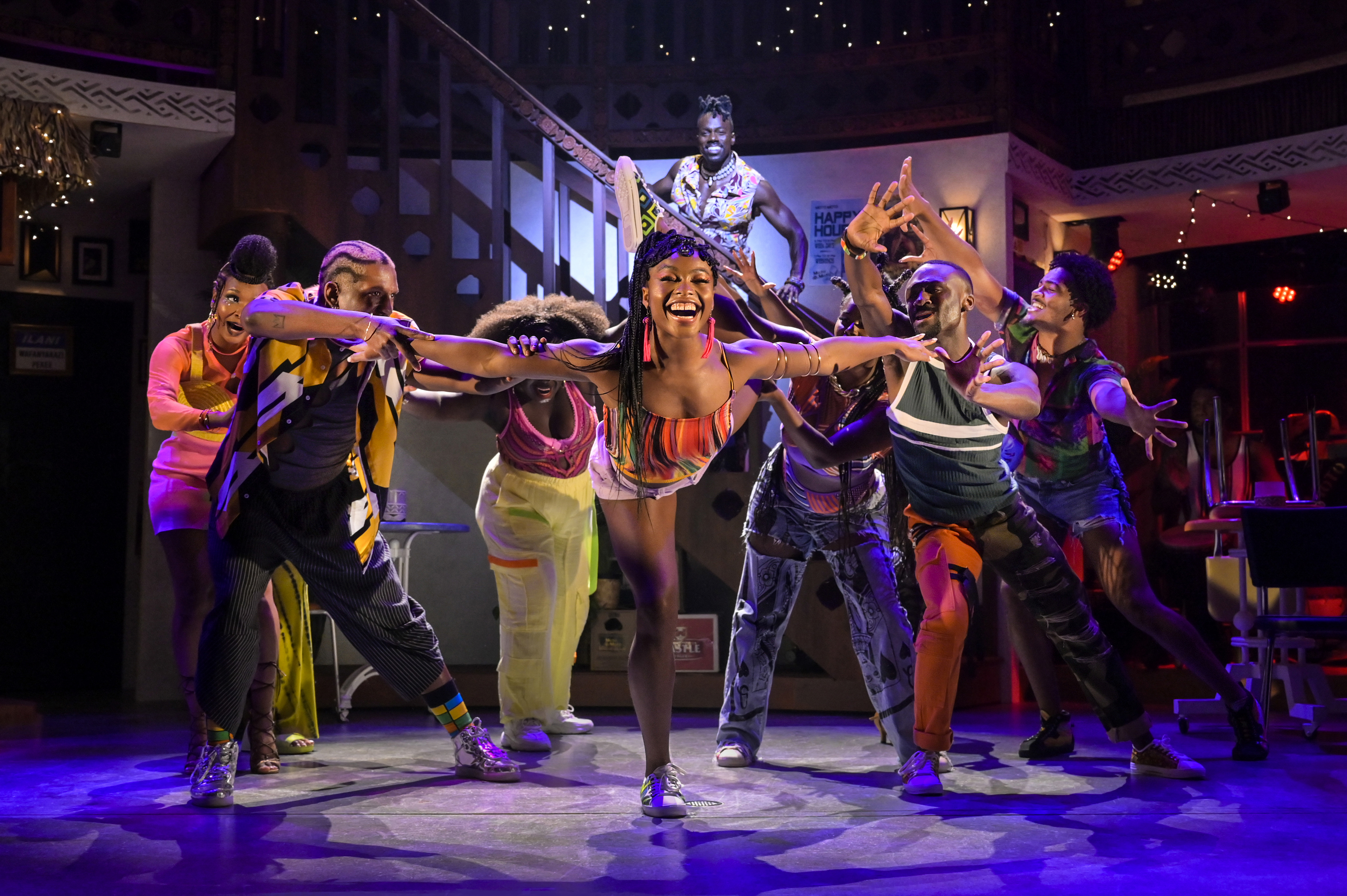 4 (center) Isio-Maya Nuwere; (l to r) Teshomech Olenja, Wade Watson, Awa Sal Secka, Quiantae Thomas, Zachary Downer, Aaron Nicholas Patterson, and (stairs) Rodrick Covington in Goddess. (Photo by Kevin Berne and Alessandra Mello/Berkeley Rep)